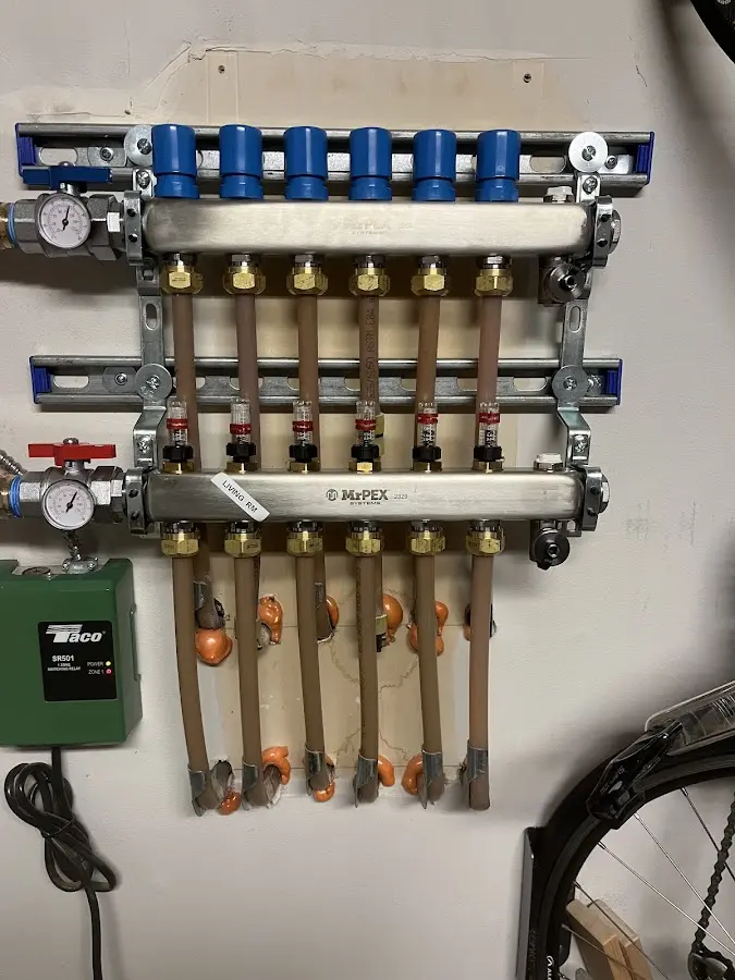 Plumber performing Water Heater Repair at a residential property in Peppermill Village